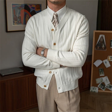 Side view showing the close-draping fit and hem length of the cardigan