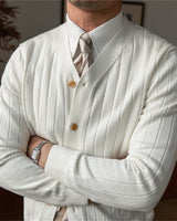 Detail shot of the deep V-neckline and button-front fastening