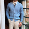 Front view of a men's fine knit ribbed cardigan with V-neck and button front