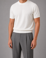 Men's fine knit jumper worn with chinos, rear view