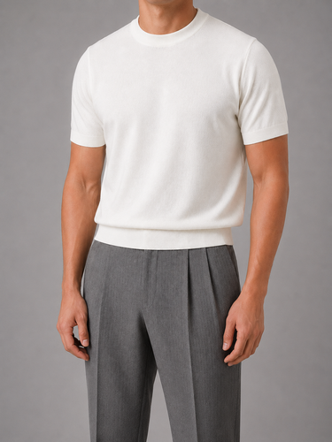 Men's fine knit jumper worn with chinos, rear view