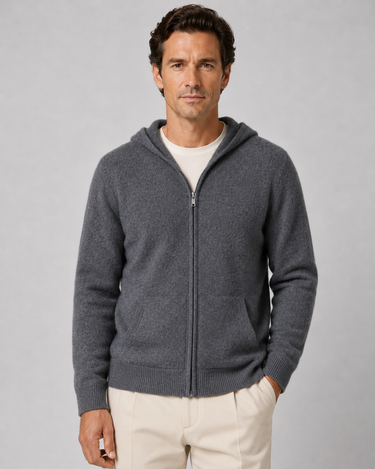 Model wearing the zip-up hoodie open over a plain T-shirt