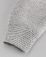 Side view showing the clean hooded silhouette and hem length