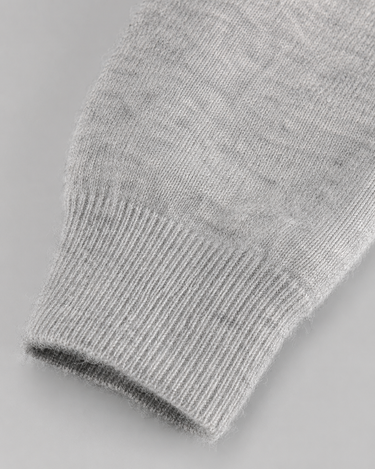 Side view showing the clean hooded silhouette and hem length