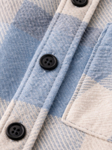 Men's flannel overshirt worn over a plain T-shirt