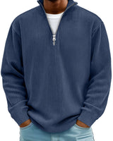 Close-up of the metal zip and raised collar detail at the neckline