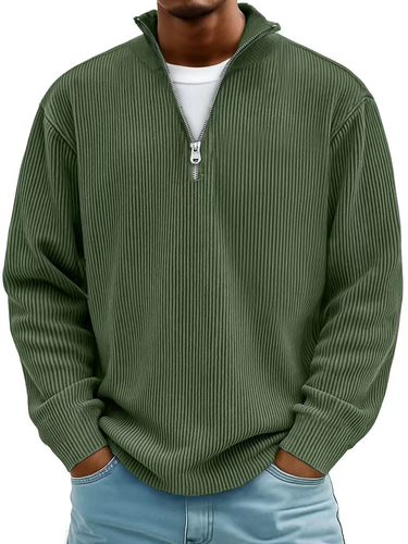 Half zip jumper styled with casual trousers, showing the layered look