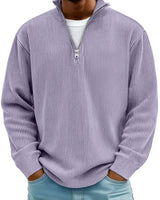 Close-up of the ribbed cuffs and hem of the half zip jumper