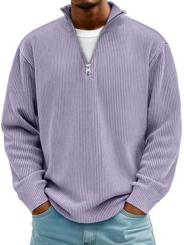 Close-up of the ribbed cuffs and hem of the half zip jumper