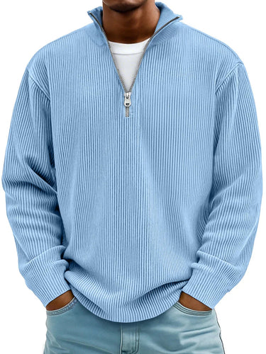 Men's ribbed half zip jumper with raised collar and metal zip detail, worn front-facing