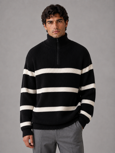 Back view of men's striped ribbed knit pullover jumper with dropped shoulders