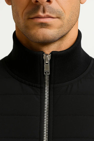 Close-up of the quilted woven front panel and zip fastening