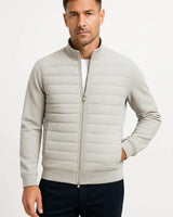 Close-up of the ribbed hem and zip pull detail