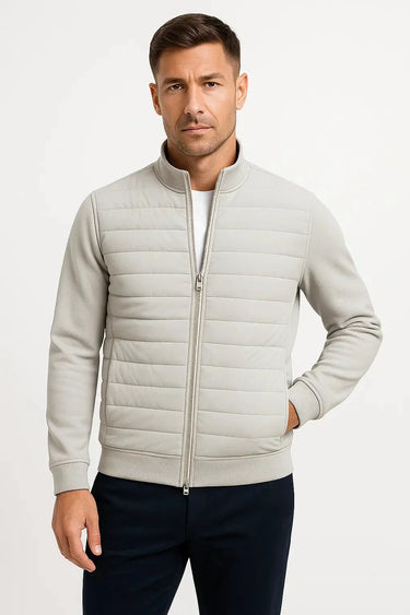 Close-up of the ribbed hem and zip pull detail