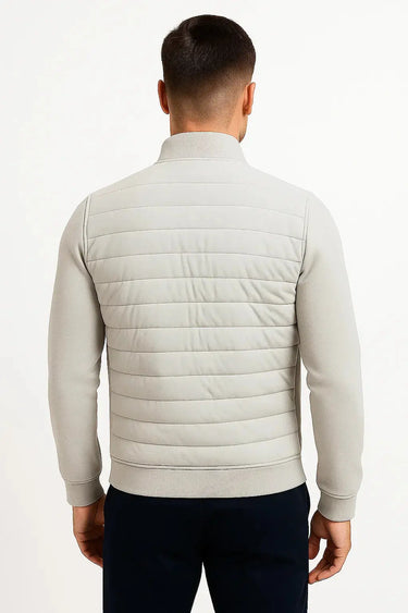 Model wearing the hybrid jacket in a casual street setting