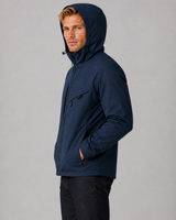 Close-up of the zipped front pockets on the men's outdoor jacket