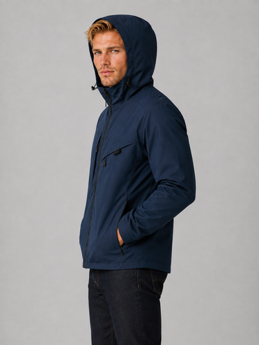 Close-up of the zipped front pockets on the men's outdoor jacket