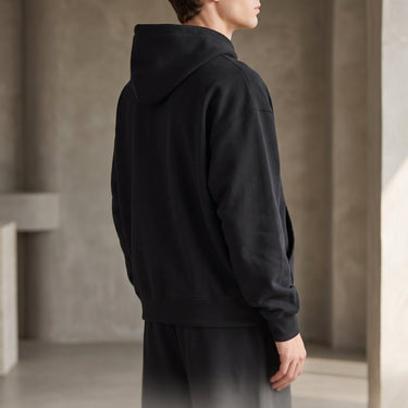 Close-up of ribbed hem on heavyweight men's hoodie
