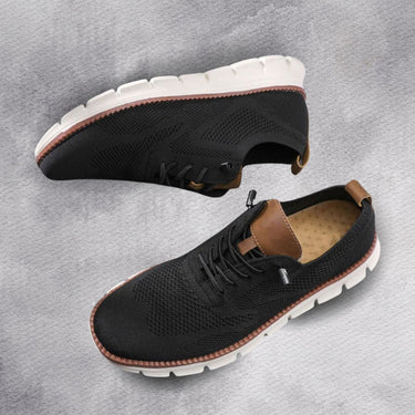 Detail shot of lace-up fastening on men's casual boots