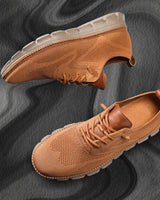 Rear view of men's lace-up boots highlighting sole construction