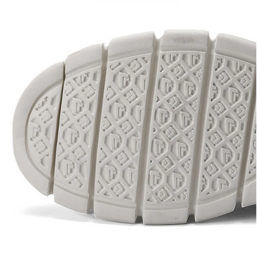 Men's lace-up boots placed flat, showing sole and overall silhouette