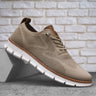 Men's lace-up boots with textured upper and segmented sole, front view