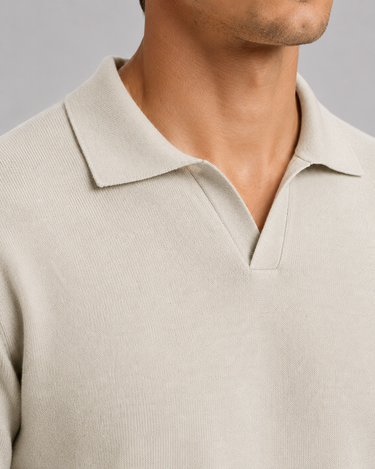 Side view of men's fine-knit polo showing ribbed hem and regular fit