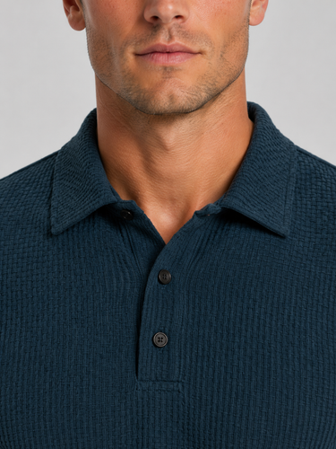 Close-up of textured knit fabric surface and polo collar detail