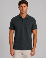 Model wearing men's textured knit polo shirt with chinos