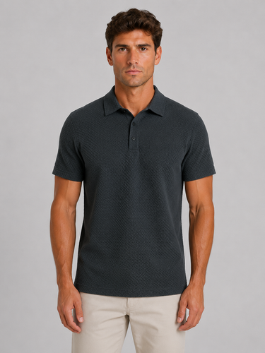 Model wearing men's textured knit polo shirt with chinos
