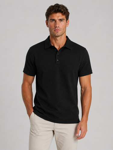 Detail shot of cuff and sleeve hem on men's knitted polo shirt