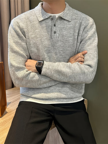 Side view of a men's ribbed knitted polo shirt showing sleeve and hem detail