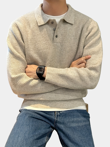 Front view of a men's long-sleeve knitted polo shirt with ribbed texture and button placket