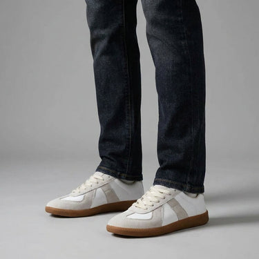 Rear view of men's low-top sneaker showing heel panel and outsole edge