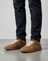 Men's low-top lace-up sneaker with panelled upper and contrast stitching, side view