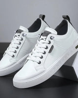 Side view of men's lace-up trainer showing textured sole and panelled upper