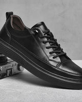 Rear view of men's boots highlighting the back pull tab at the heel