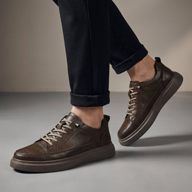 Close-up of the multiple eyelet lace-up closure on men's low-top boots