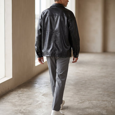 Front view of a loose-fit men's leather biker jacket