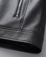 Close-up of the stand collar and zip fastening detail on the leather jacket