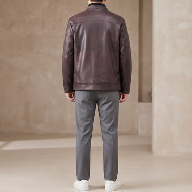 Three-quarter view of the leather jacket showing the overall loose fit