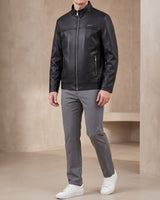 Front view of a loose-fit biker leather jacket with stand collar and zip fastening