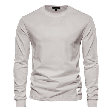 Close-up of the fitted cuffs on a men's long sleeve polo shirt