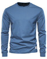 Close-up of the hem on a men's long sleeve polo shirt