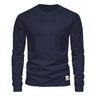 Man wearing a long sleeve polo shirt with a crew neckline and straight hem