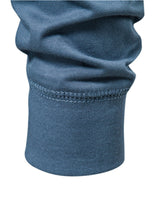 Full-length view of men's long sleeve Henley T-shirt with straight hem