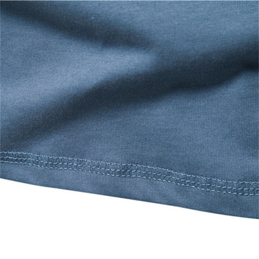 Detail shot of button placket on a men's Henley T-shirt