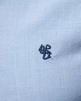 Men's long sleeve shirt with embroidered chest motif and contrast trim
