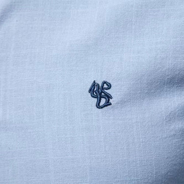 Men's long sleeve shirt with embroidered chest motif and contrast trim