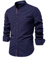 Close-up of contrast trim along the upper placket of a men's shirt
